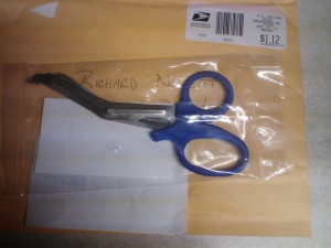 The blue handled med kit shears 
